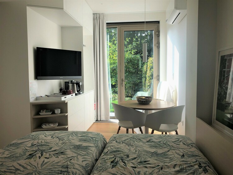 Habitación en B&B Het Nekkerhof con vistas al jardín